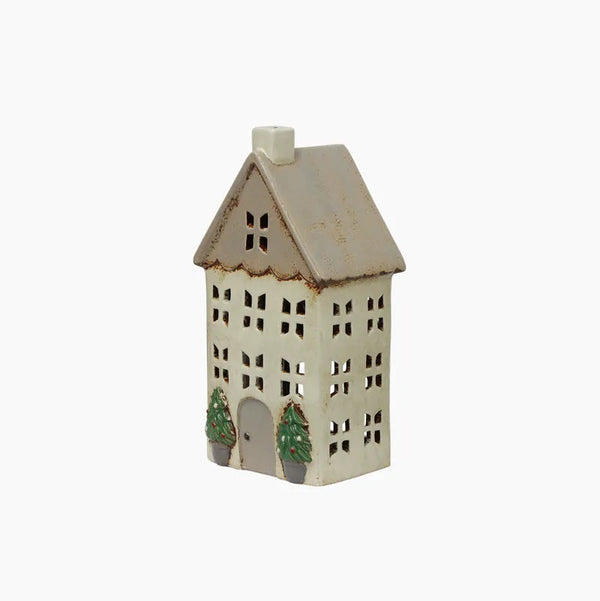 Decorative house-shaped lantern with a white base and brown roof on a white background