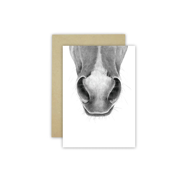 White gift card with black pencil drawing of the muzzle of a horse alongside a kraft envelope. Drawn by australian artist Cathy Hamilton.