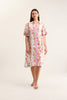 Woman wearing a floral dress with a white background